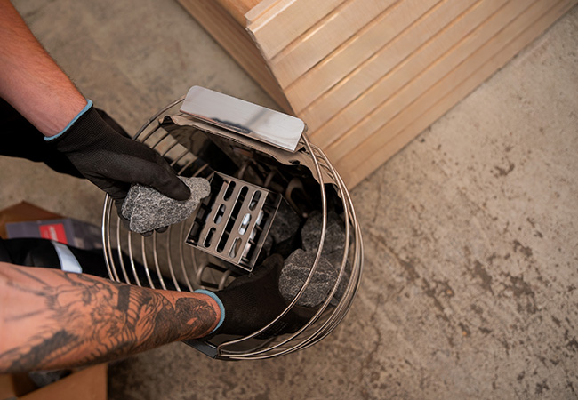 Камни для сауны и их укладка осенью: ТОП-3 схемы по фракциям и потокам воздуха